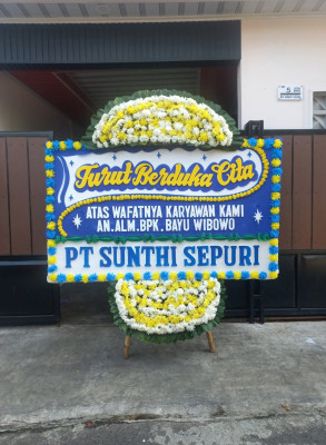 Papan Bunga Duka di Yakomi