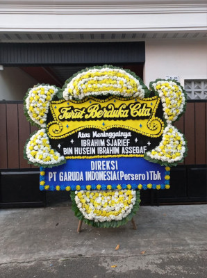 Papan Bunga Duka di Yakomi