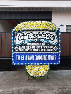 Papan Bunga Duka di Yakomi